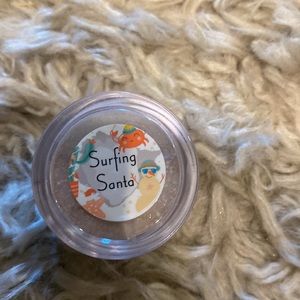 Peppi powder surfing Santa